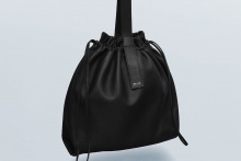 real leather drawstring tote & hand bag