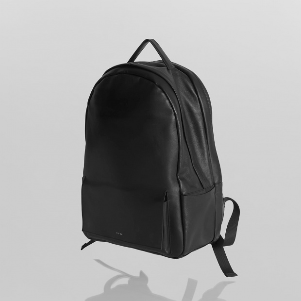 real leather flap pocket round backpack